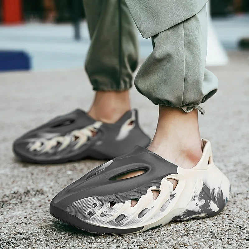 Perforated beach sandals with an EVA sole for men