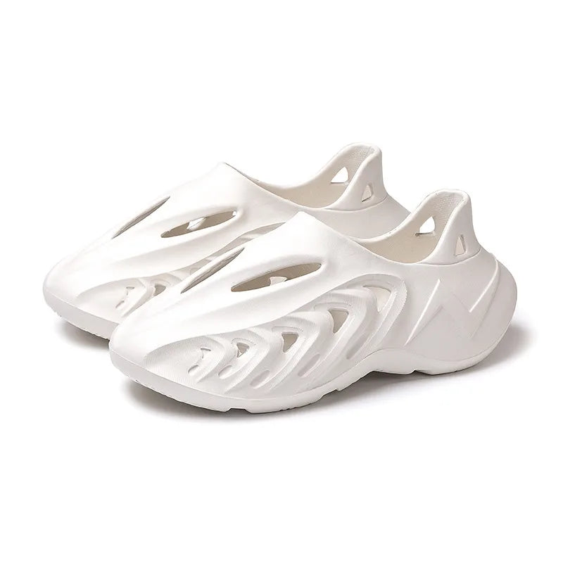 Perforated beach sandals with an EVA sole for men
