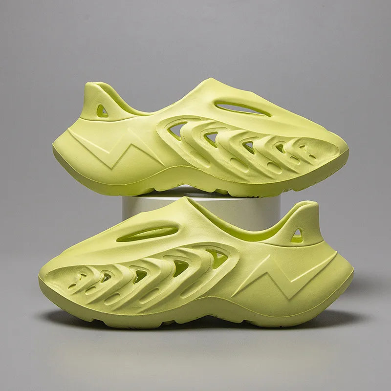 Perforated beach sandals with an EVA sole for men