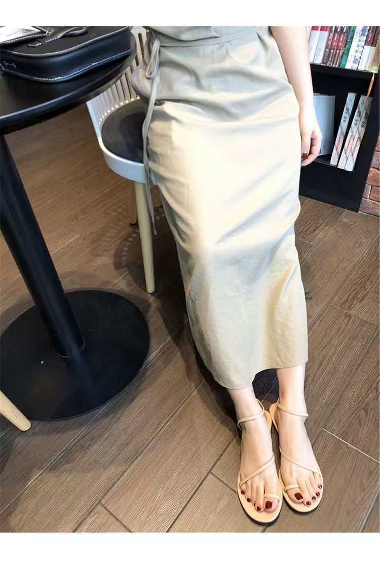 Women’s thin-strap flat sandals with an open toe for everyday summer wear