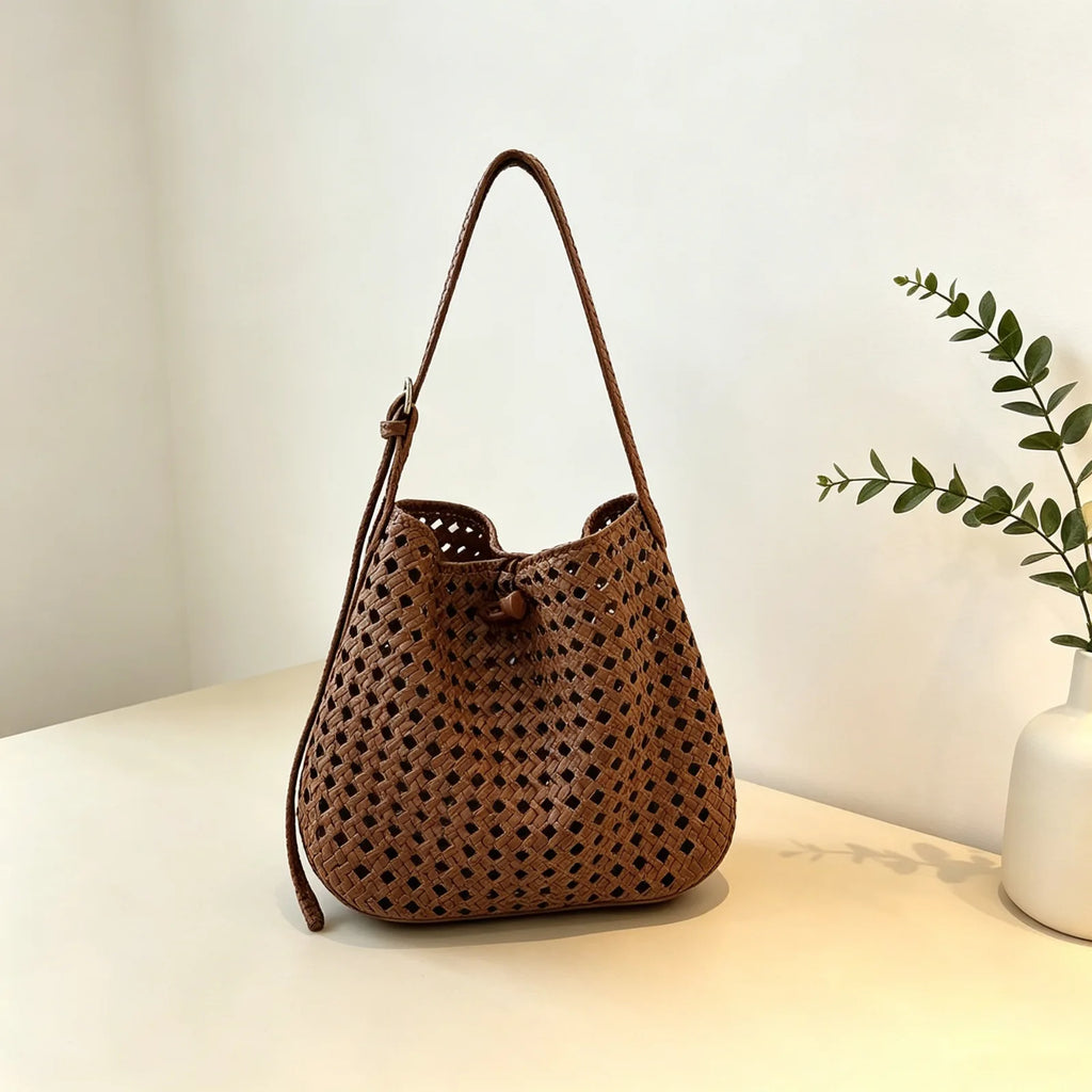 Hollow-out woven bucket bag for casual, beach-ready outings