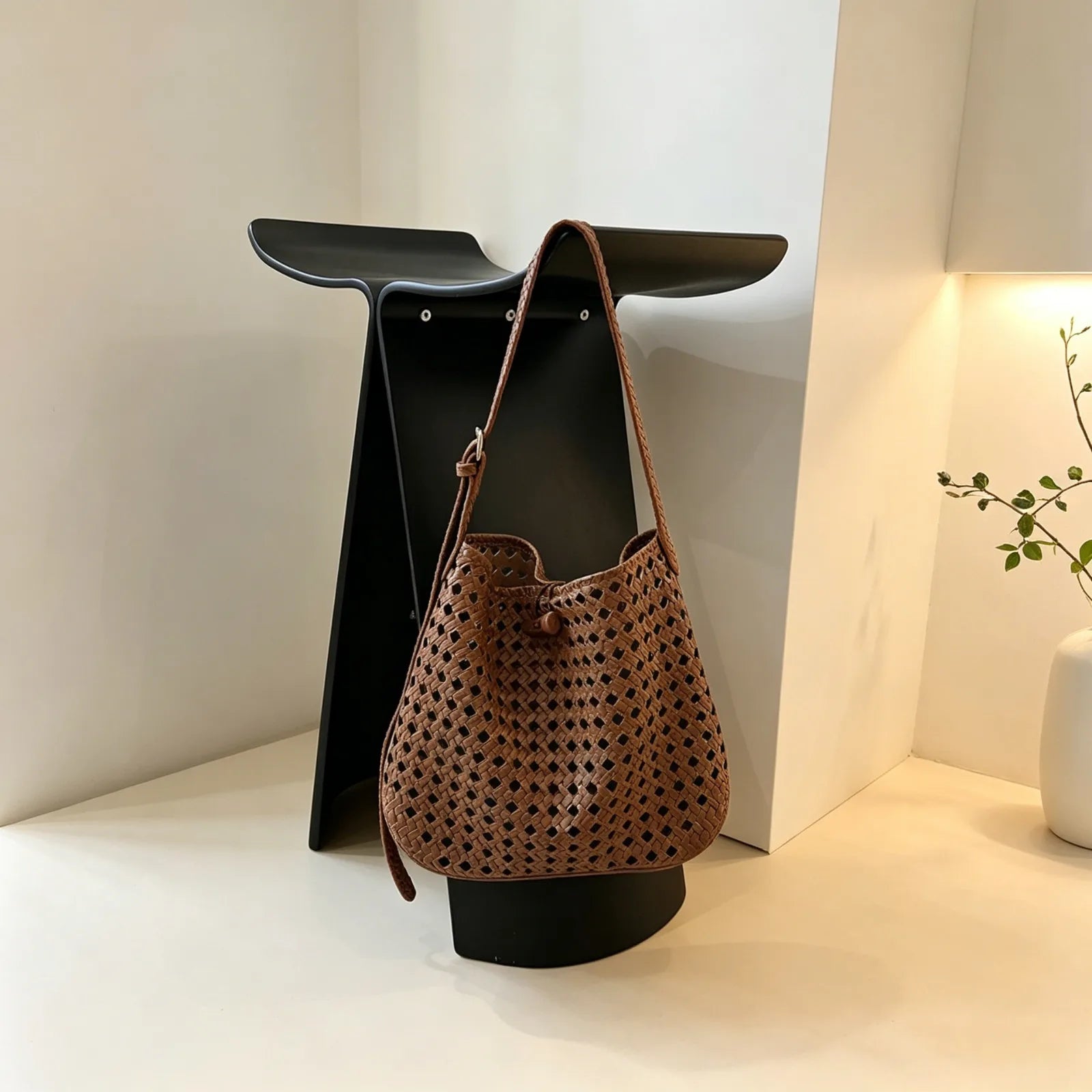 Hollow-out woven bucket bag for casual, beach-ready outings