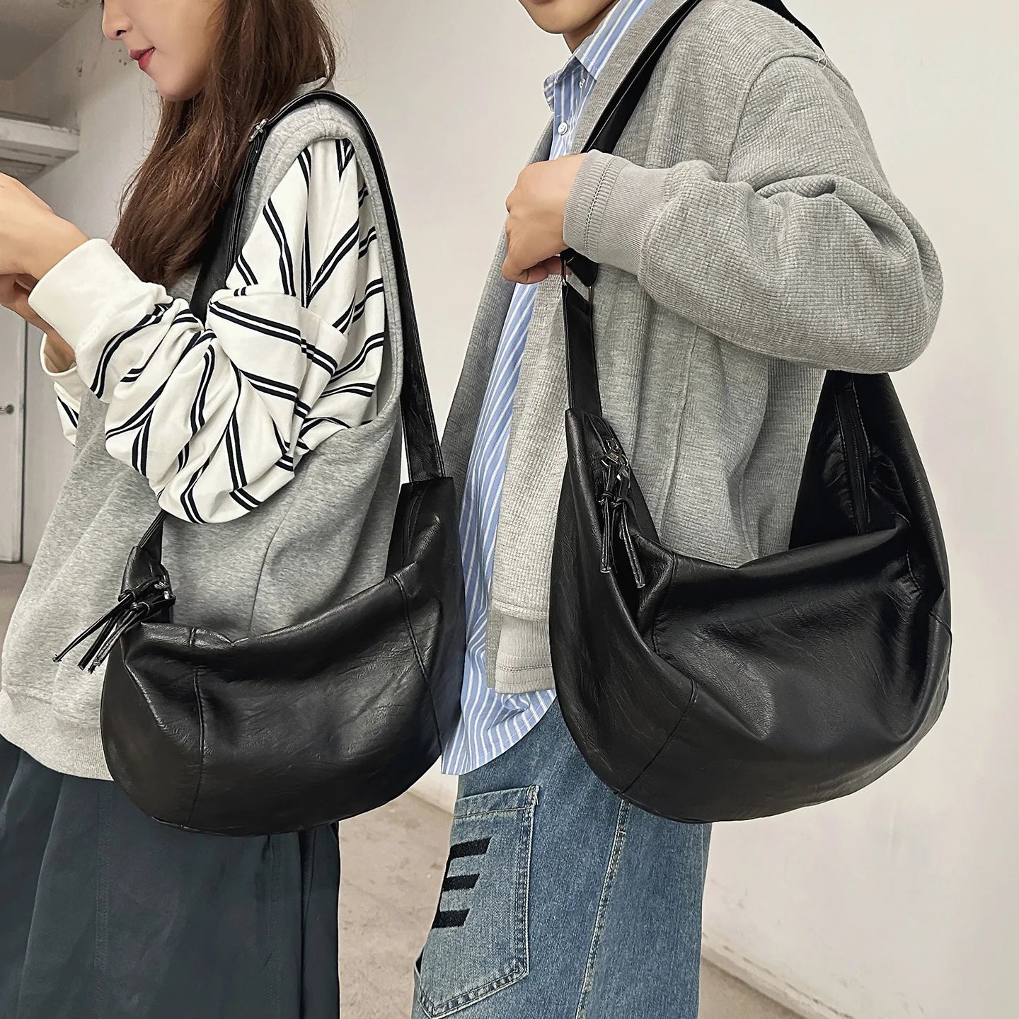 Curved hobo crossbody bag in PU leather – adjustable strap for commuting or riding