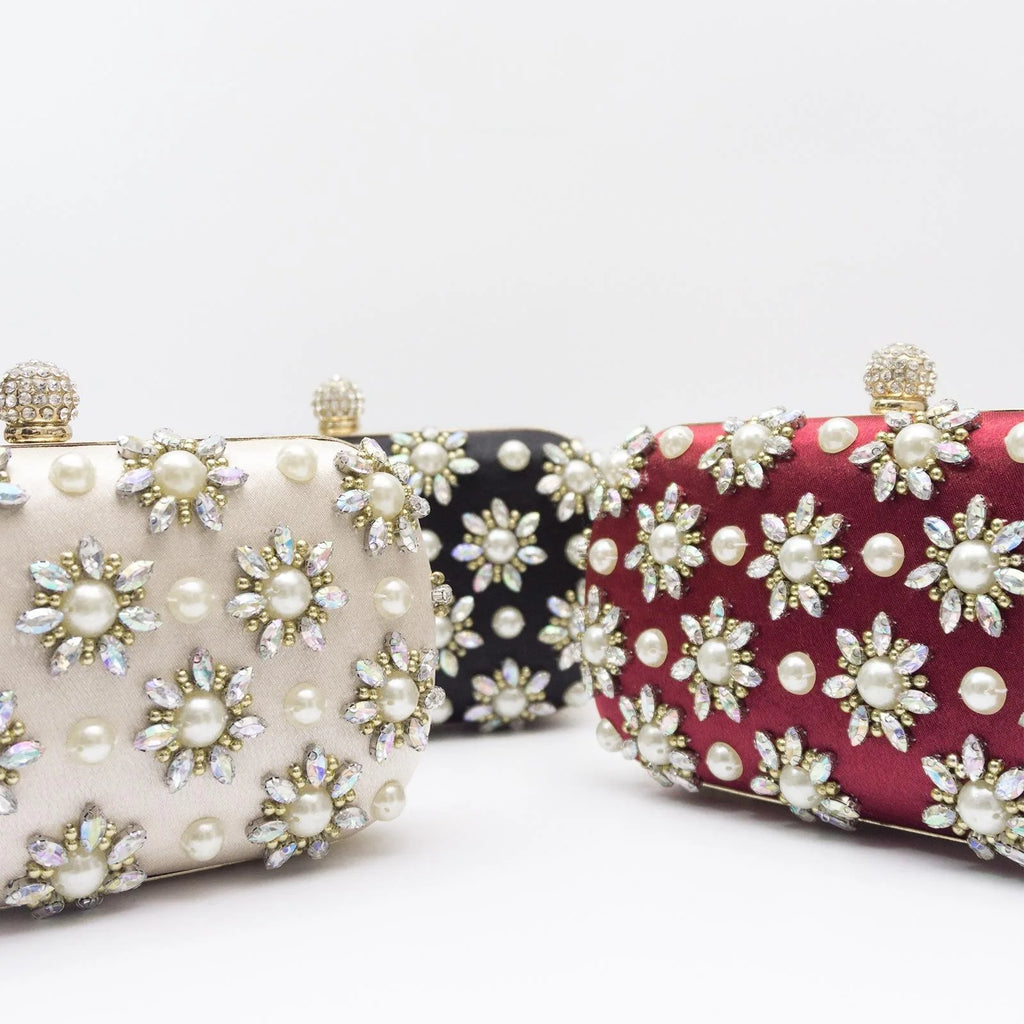 Rhinestone-embellished evening bag with chain strap – oval clutch for special occasions