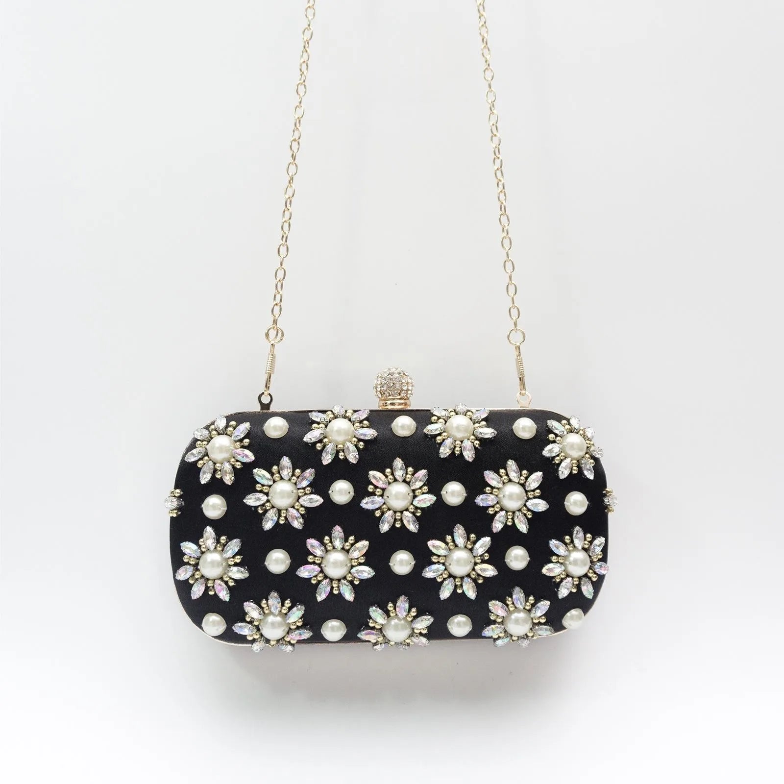 Rhinestone-embellished evening bag with chain strap – oval clutch for special occasions