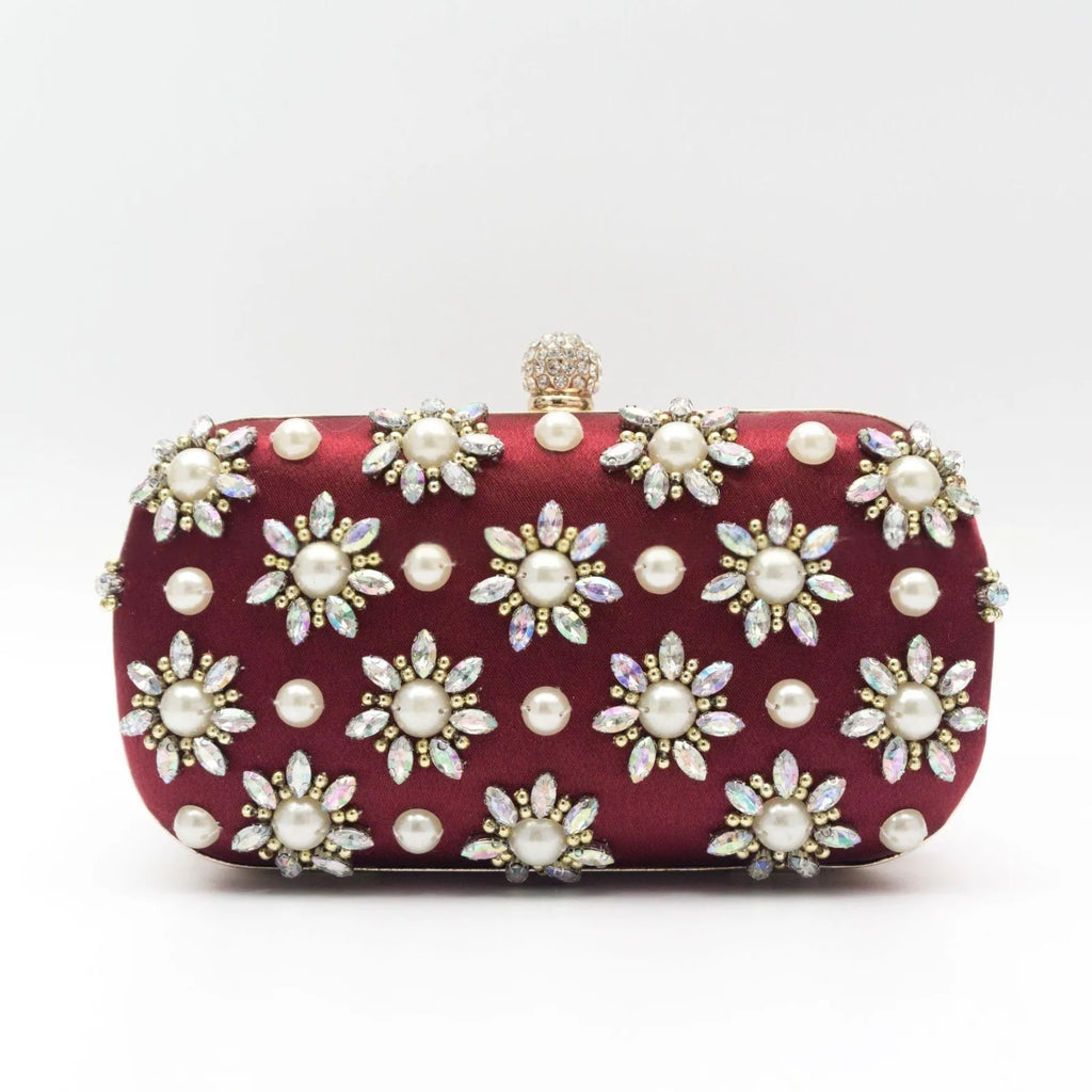 Rhinestone-embellished evening bag with chain strap – oval clutch for special occasions