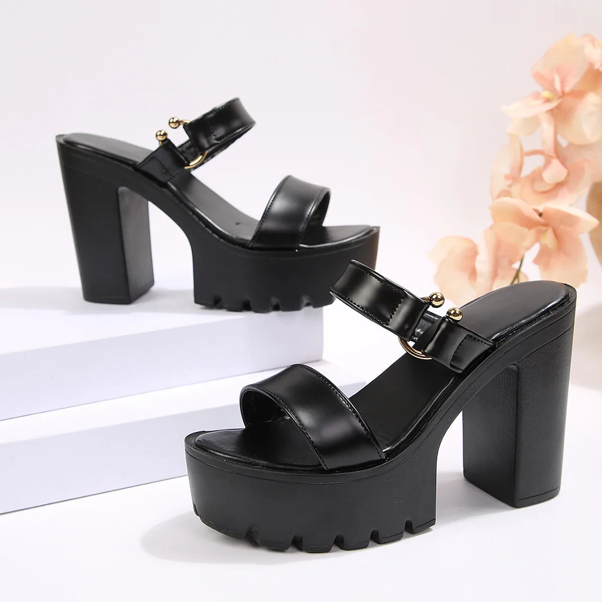 Chunky high-heel slide sandals with a rivet strap detail