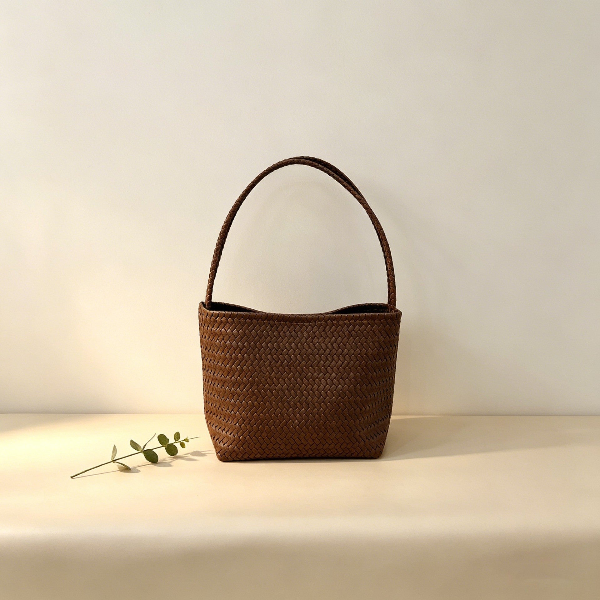 Woven-pattern bucket bag with double straps for everyday wear