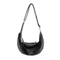 Curved hobo crossbody bag in PU leather – adjustable strap for commuting or riding
