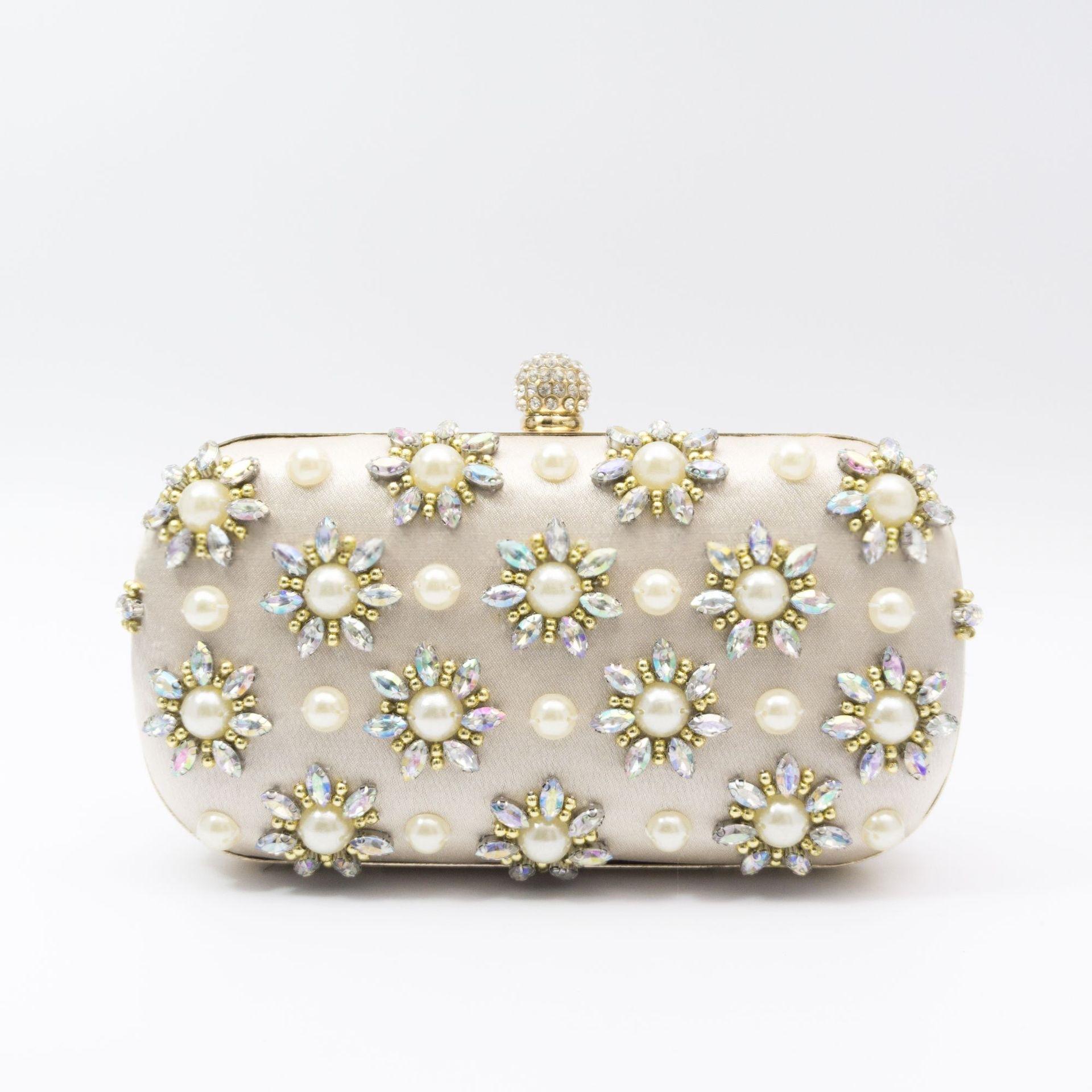 Rhinestone-embellished evening bag with chain strap – oval clutch for special occasions