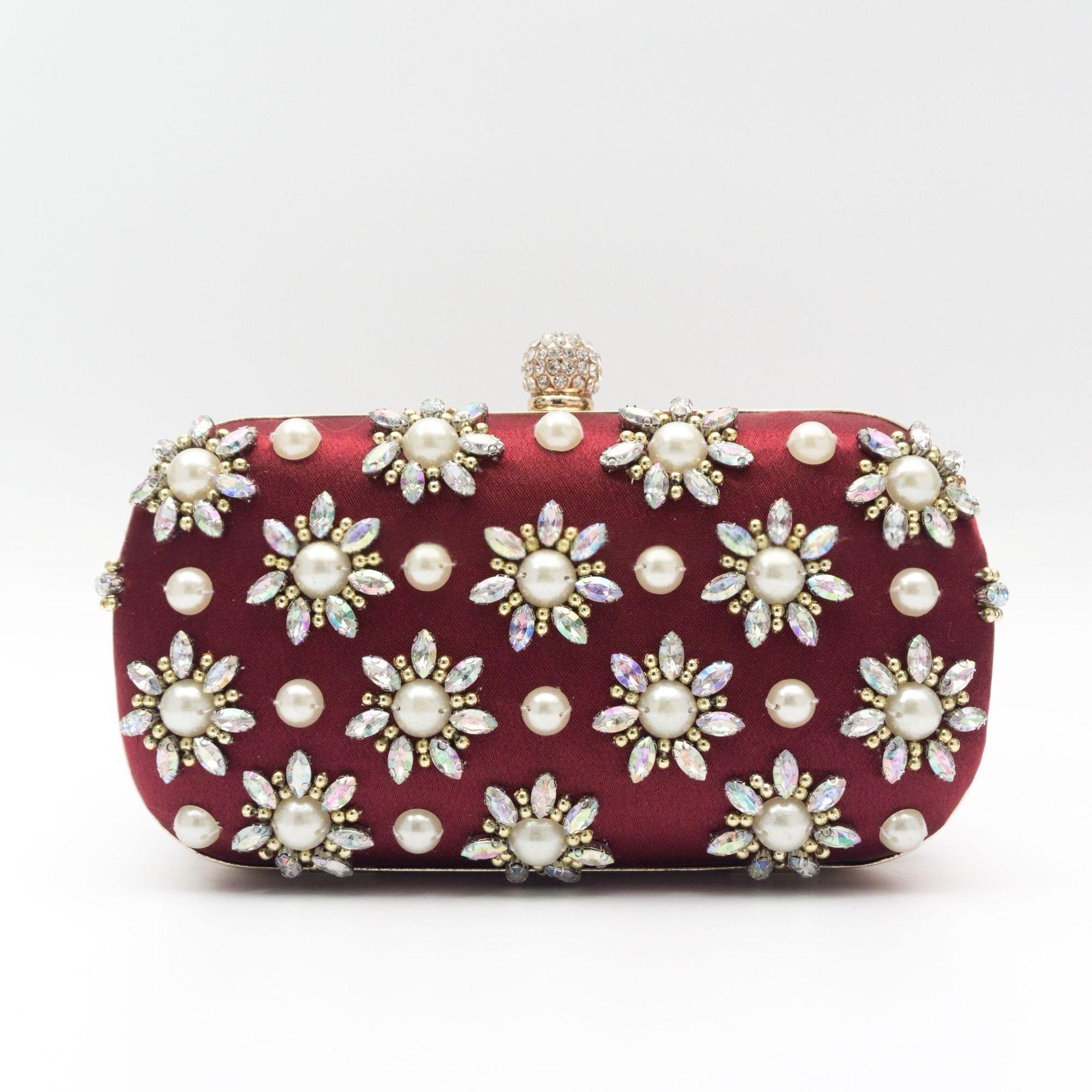 Rhinestone-embellished evening bag with chain strap – oval clutch for special occasions