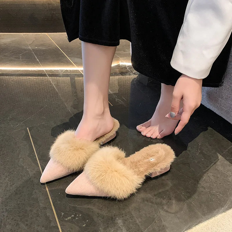 Pointed-toe suede mules with a faux-fur lining for cozy fall and winter wear