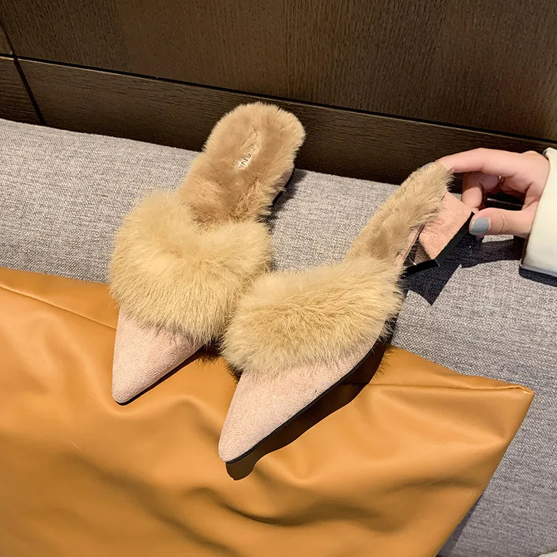 Pointed-toe suede mules with a faux-fur lining for cozy fall and winter wear