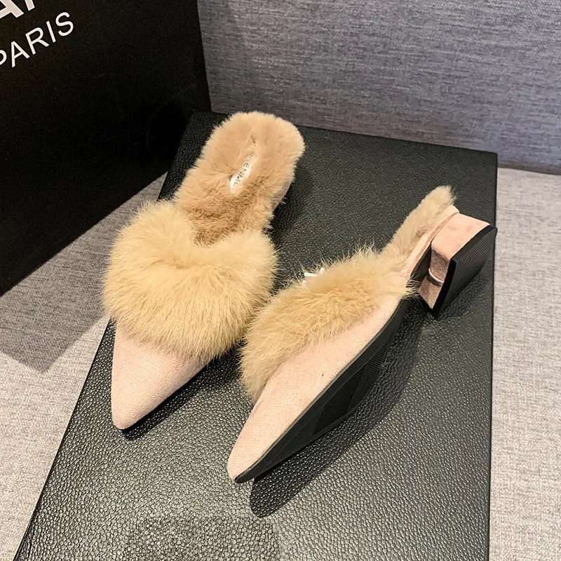 Pointed-toe suede mules with a faux-fur lining for cozy fall and winter wear