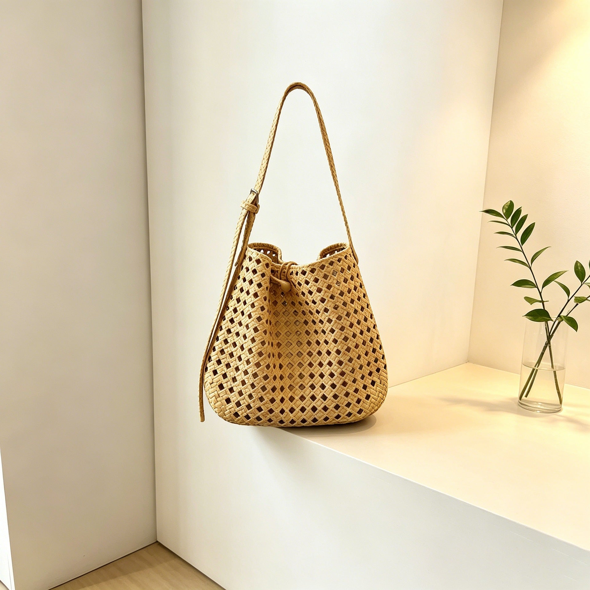 Hollow-out woven bucket bag for casual, beach-ready outings