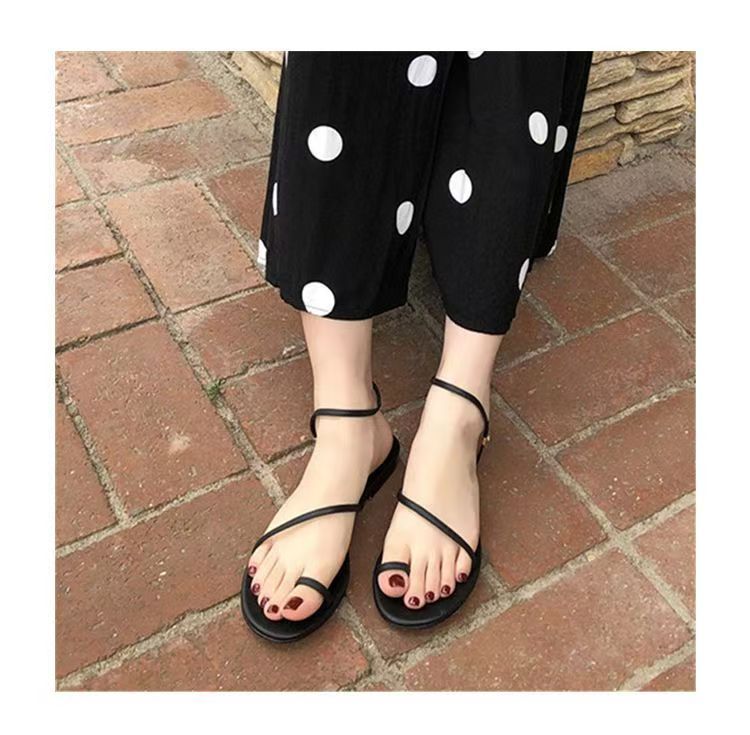 Women’s thin-strap flat sandals with an open toe for everyday summer wear