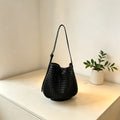 Hollow-out woven bucket bag for casual, beach-ready outings