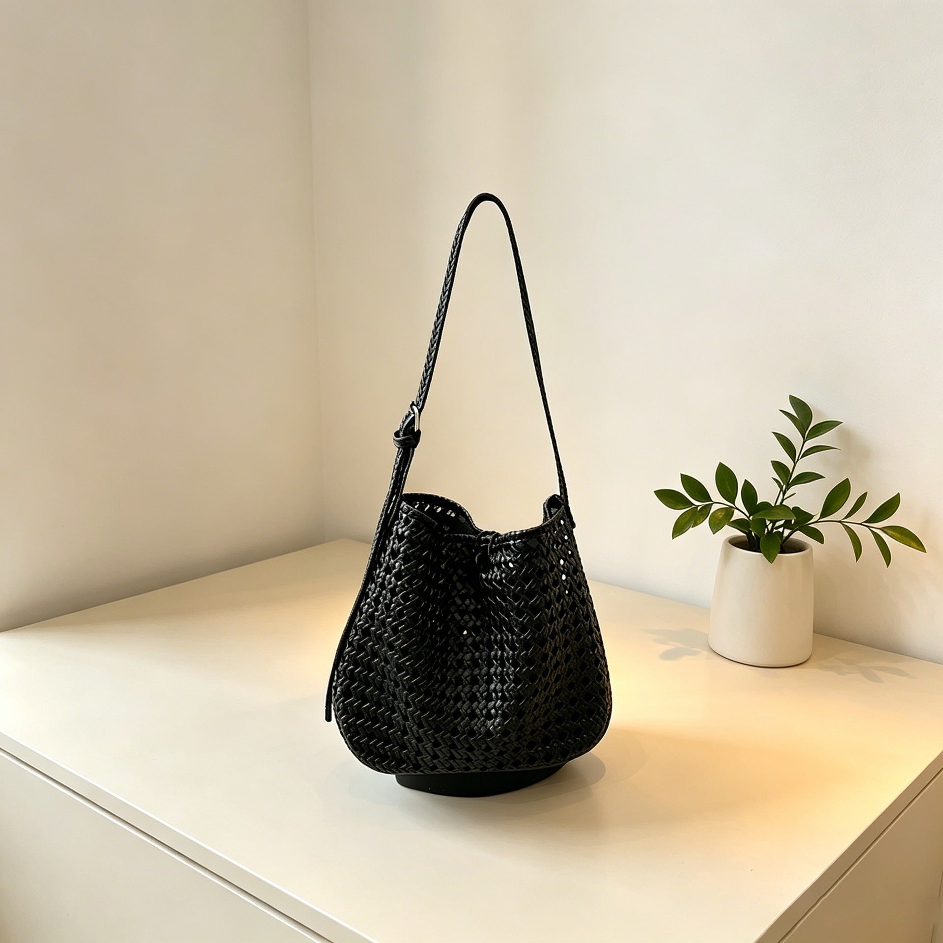 Hollow-out woven bucket bag for casual, beach-ready outings